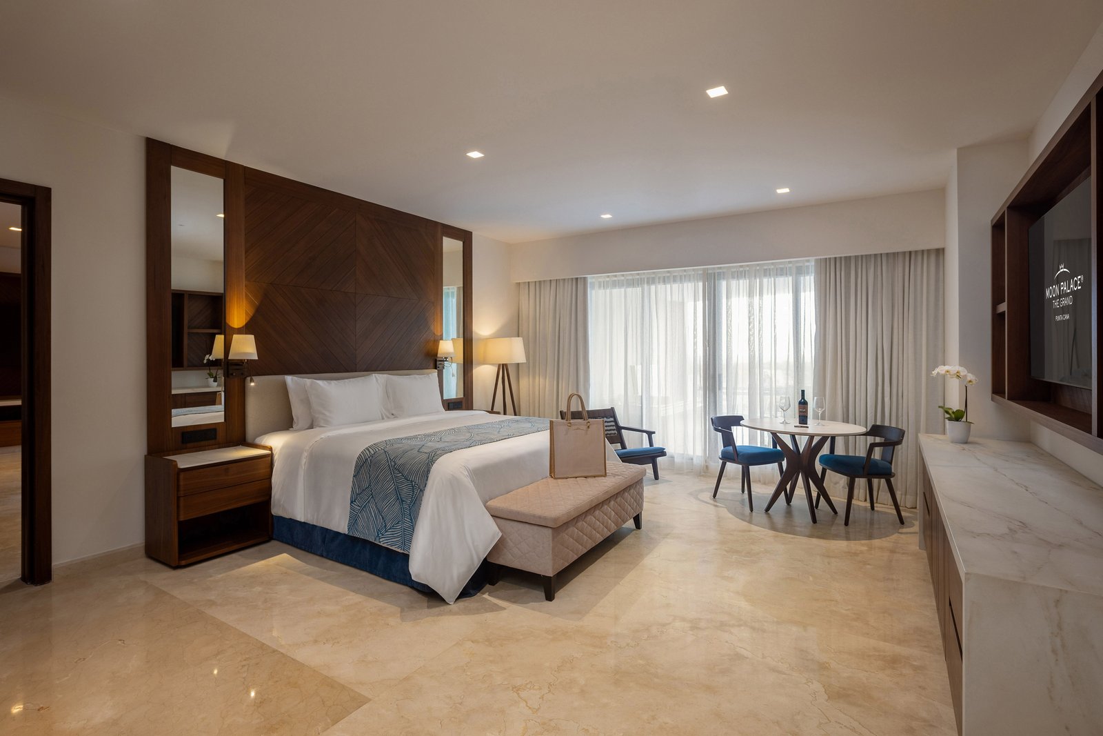 Grand Suite Presidencial bedroom with king bed and ocean views at Moon Palace The Grand